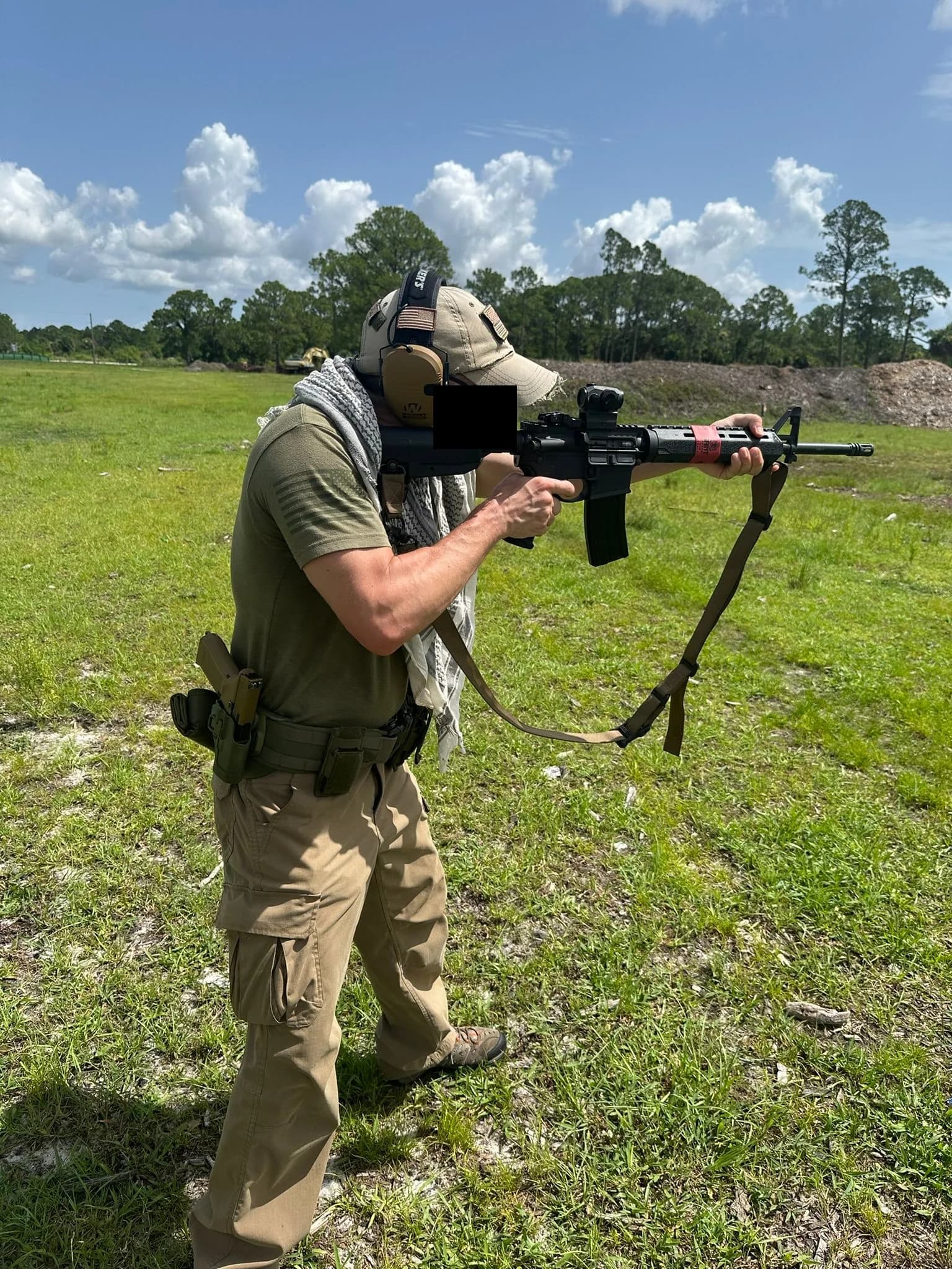 A candidate running carbine diagnostics on the academy range